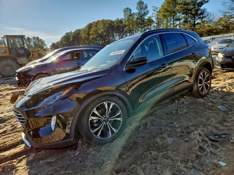 FORD ESCAPE TIT 2021 with VIN 1FMCU0DZ5MUB17268 - Photo from auction