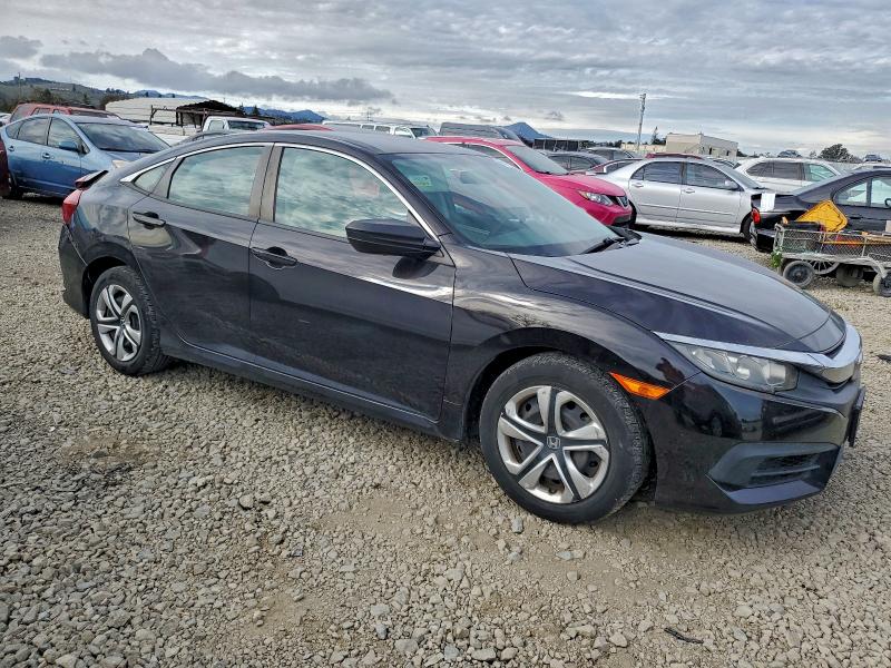 Фото 4 с аукциона – 2016 HONDA CIVIC LX с VIN 19XFC2F55GE245622