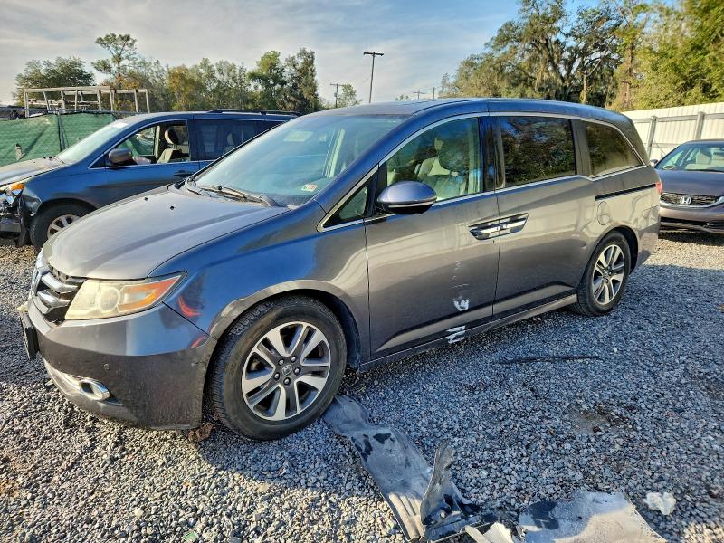 HONDA ODYSSEY 2014 with VIN 5FNRL5H99EB085704 - Photo from auction