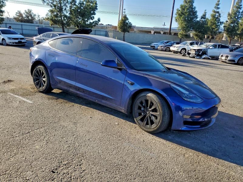 Photo 4 from auction – 2021 TESLA MODEL 3 with VIN 5YJ3E1EA0MF067842