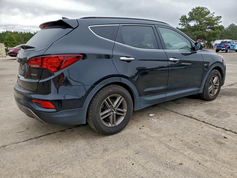 Photo 3 from auction – 2017 HYUNDAI SANTA FE S with VIN 5NMZU3LB5HH019455