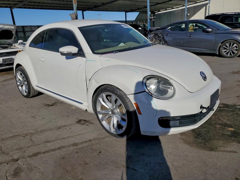 Photo 4 from auction – 2013 VOLKSWAGEN BEETLE with VIN 3VWJX7AT2DM669016