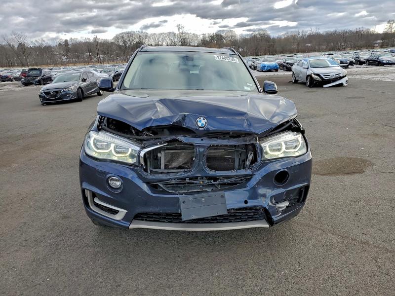 Photo 5 from auction – 2014 BMW X5 XDRIVE5 with VIN 5UXKR6C54E0J72921