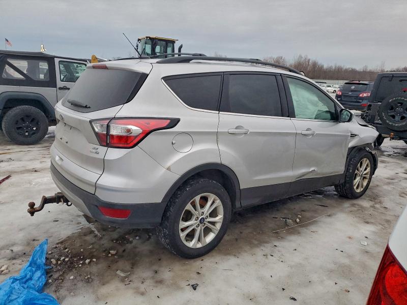 Photo 3 from auction – 2018 FORD ESCAPE SE with VIN 1FMCU9GD5JUC05480