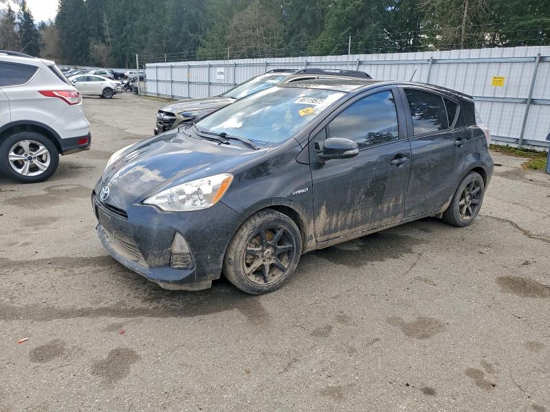 TOYOTA PRIUS C 2014 with VIN JTDKDTB35E1068768 - Photo from auction