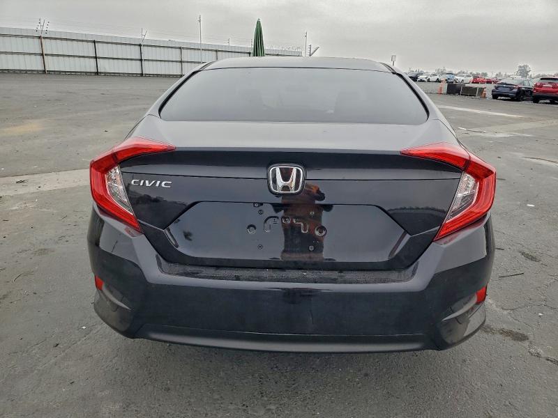 Photo 6 from auction – 2016 HONDA CIVIC LX with VIN 2HGFC2F56GH550486
