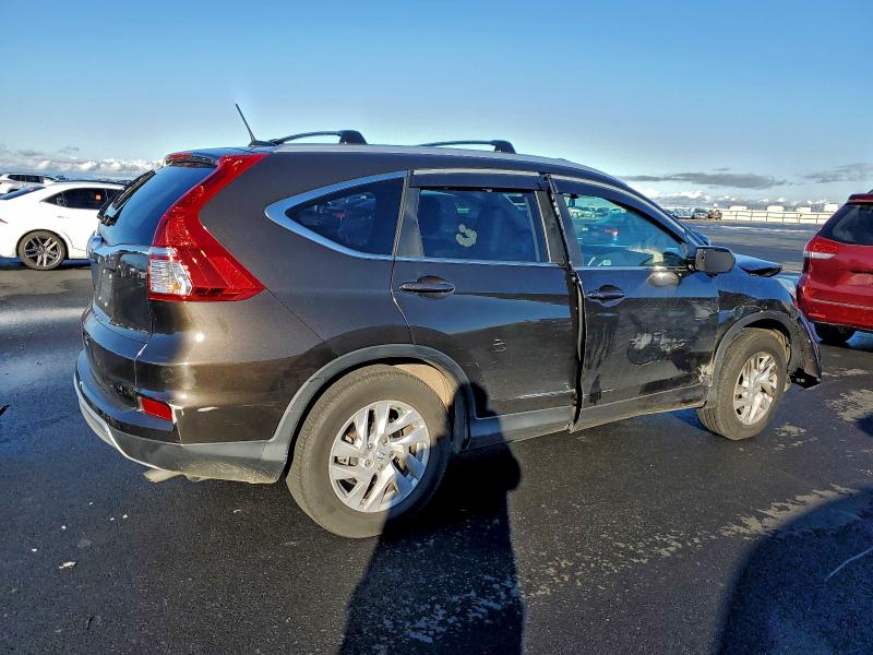 Photo 3 from auction – 2015 HONDA CR-V EXL with VIN 2HKRM3H77FH502224