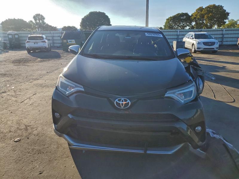 Photo 5 from auction – 2016 TOYOTA RAV4 SE with VIN JTMJFREV7GD183282