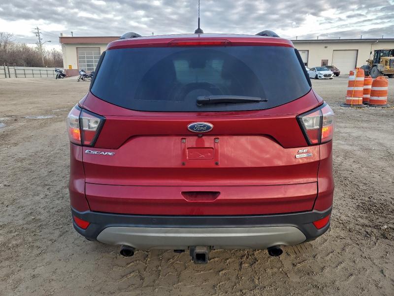 Photo 6 from auction – 2017 FORD ESCAPE with VIN 1FMCU9G96HUD38173