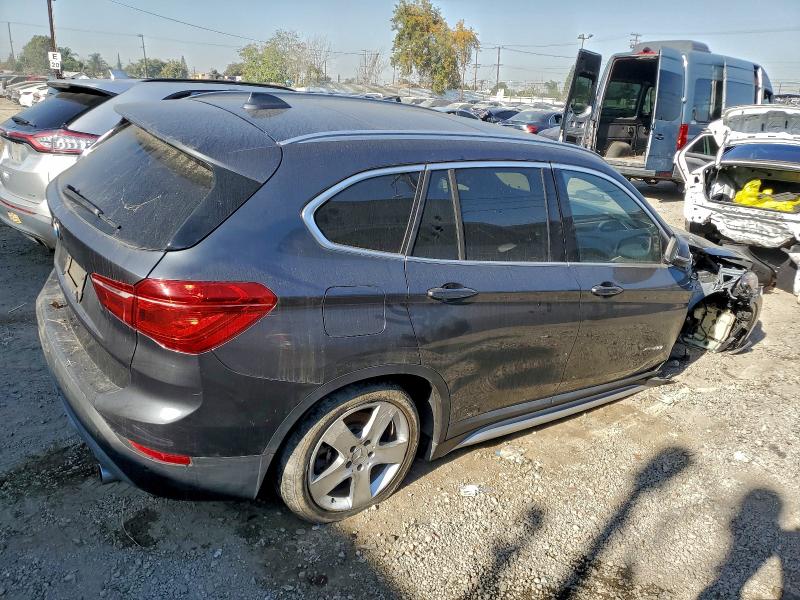 Photo 3 from auction – 2016 BMW X1 XDRIVE2 with VIN WBXHT3C32G5F66178