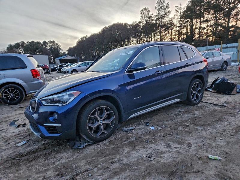 BMW X1 XDRIVE2 2018 with VIN WBXHT3C35J5F88909 - Photo from auction