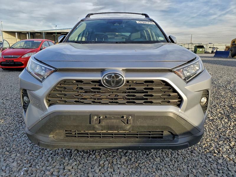 Photo 5 from auction – 2019 TOYOTA RAV4 XLE with VIN JTMP1RFV8KD036971