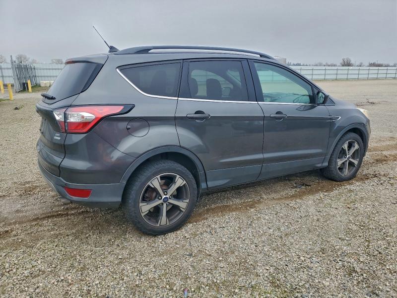 Photo 3 from auction – 2018 FORD ESCAPE SEL with VIN 1FMCU0HD0JUB48051