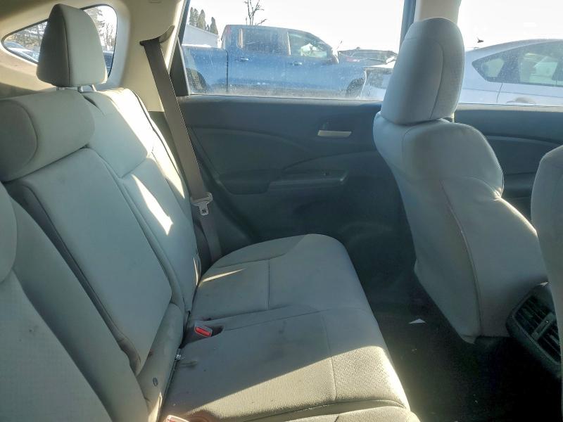 Photo 11 from auction – 2015 HONDA CR-V LX with VIN 5J6RM4H38FL073099