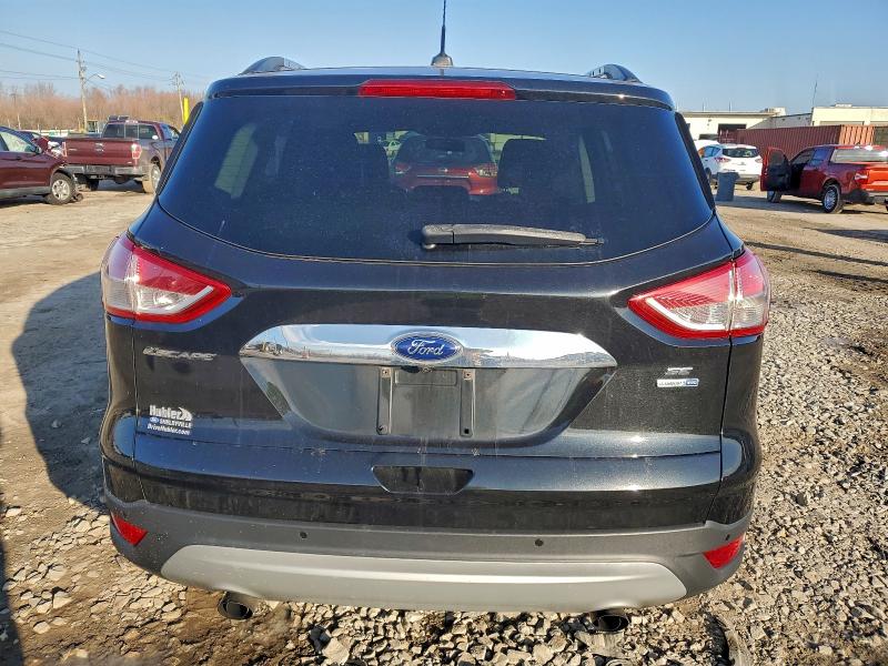 Photo 6 from auction – 2014 FORD ESCAPE SE with VIN 1FMCU9G98EUE50033