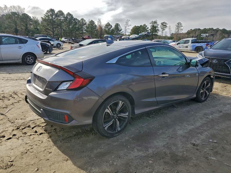 Photo 3 from auction – 2018 HONDA CIVIC TOUR with VIN 2HGFC3B96JH351394
