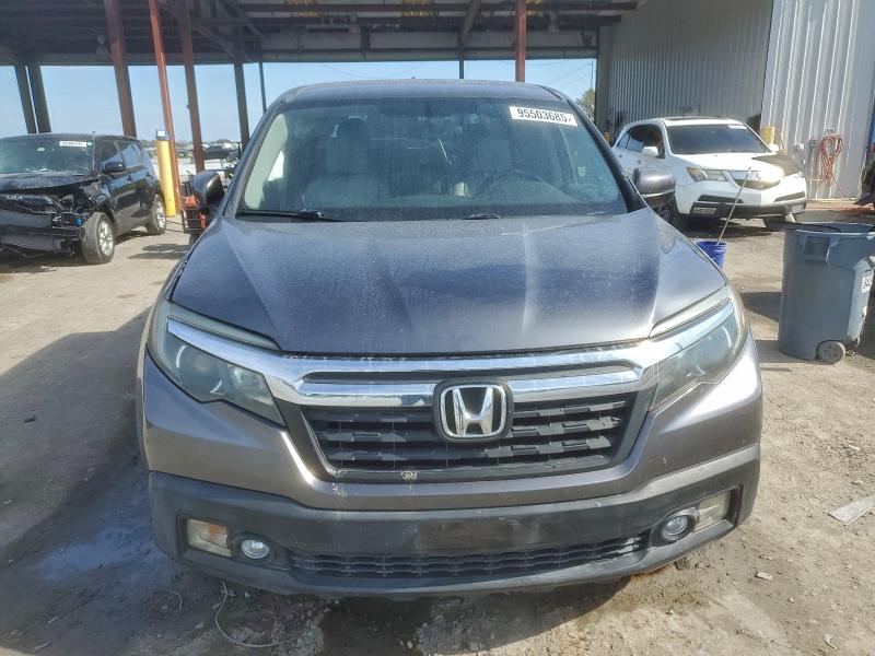 Photo 5 from auction – 2017 HONDA RIDGELINE with VIN 5FPYK3F57HB023037