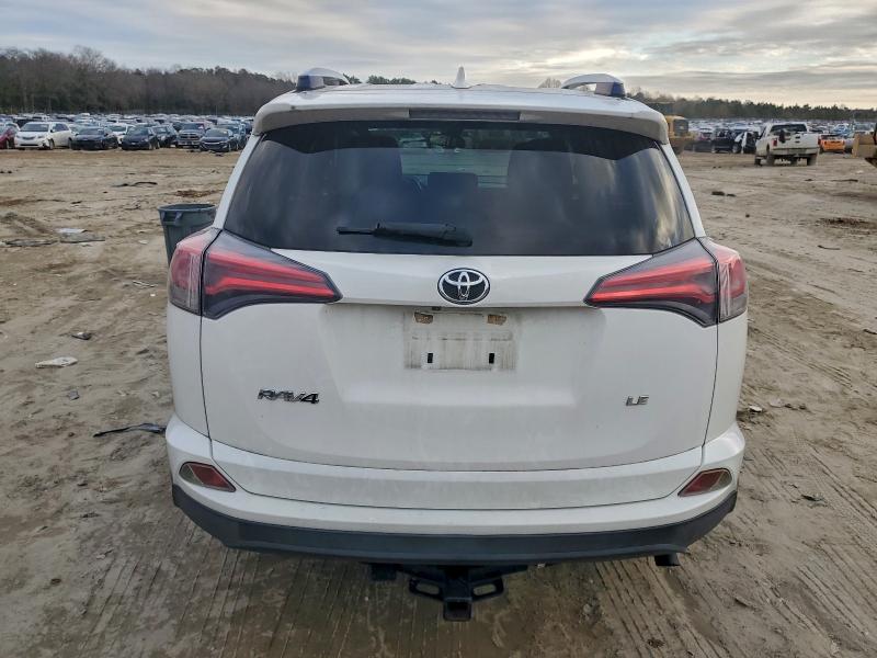 Photo 6 from auction – 2017 TOYOTA RAV4 with VIN JTMZFREV4HJ139956