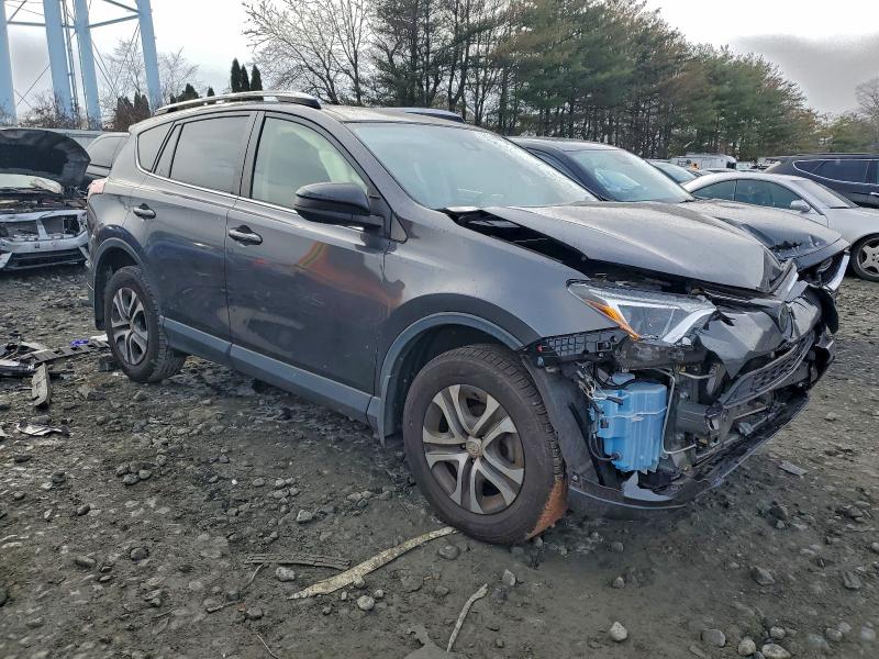 Photo 4 from auction – 2018 TOYOTA RAV4 LE with VIN JTMBFREV1JJ200770