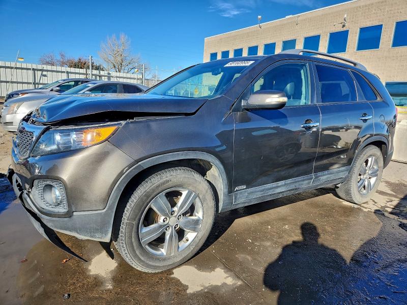 KIA SORENTO 2013 with VIN 5XYKUDA2XDG412110 - Photo from auction