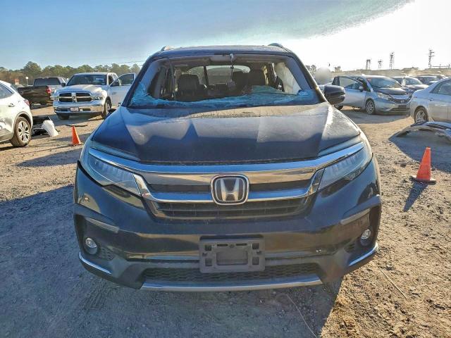 Photo 5 from auction – 2019 HONDA PILOT TOUR with VIN 5FNYF5H67KB038949