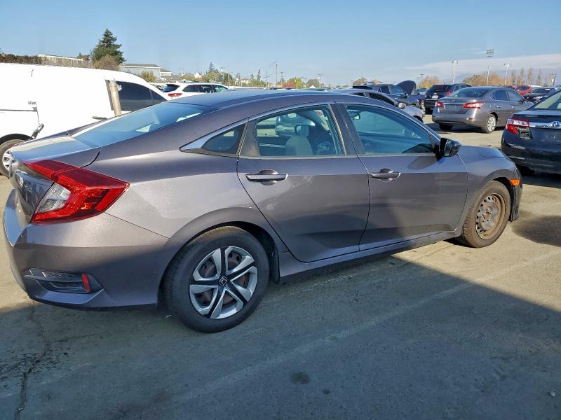 Photo 3 from auction – 2018 HONDA CIVIC LX with VIN 2HGFC2F59JH502293