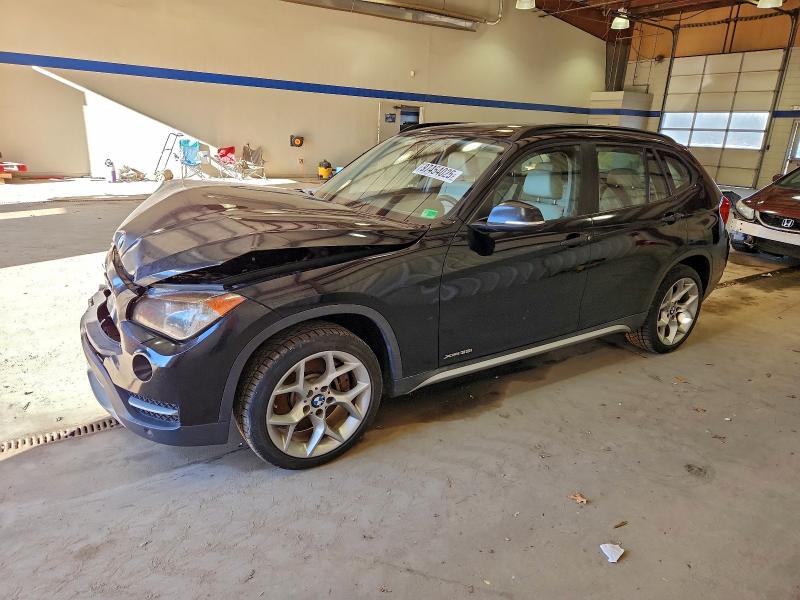 BMW X1 XDRIVE3 2013 with VIN WBAVM5C57DVV89357 - Photo from auction