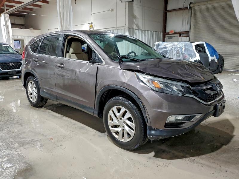 Photo 4 from auction – 2015 HONDA CR-V EX with VIN 2HKRM4H58FH615829