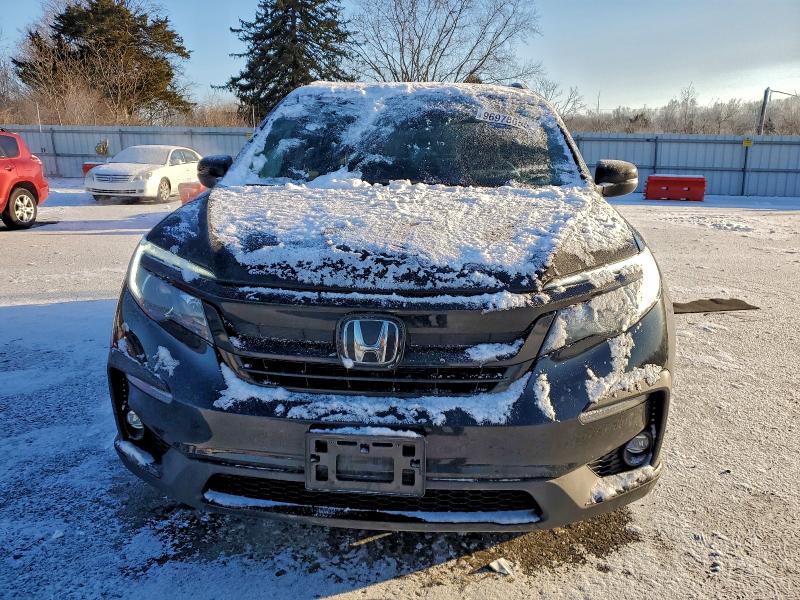Photo 5 from auction – 2022 HONDA PILOT SE with VIN 5FNYF6H27NB094560