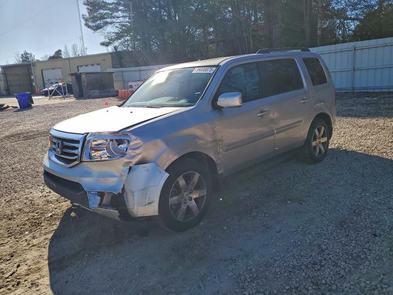 HONDA PILOT TOUR 2014 with VIN 5FNYF4H96EB014683 - Photo from auction