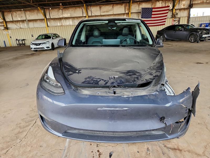 Photo 5 from auction – 2022 TESLA MODEL Y with VIN 7SAYGDEE4NA015569