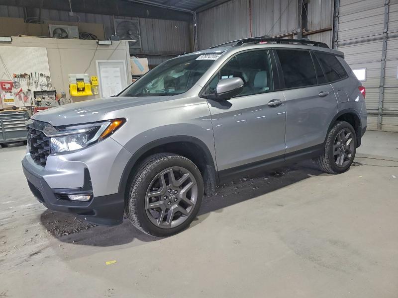 HONDA PASSPORT E 2023 with VIN 5FNYF8H5XPB038041 - Photo from auction