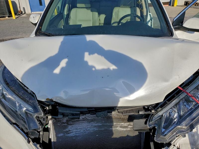 Photo 11 from auction – 2016 HONDA CR-V EXL with VIN 5J6RM4H70GL033376