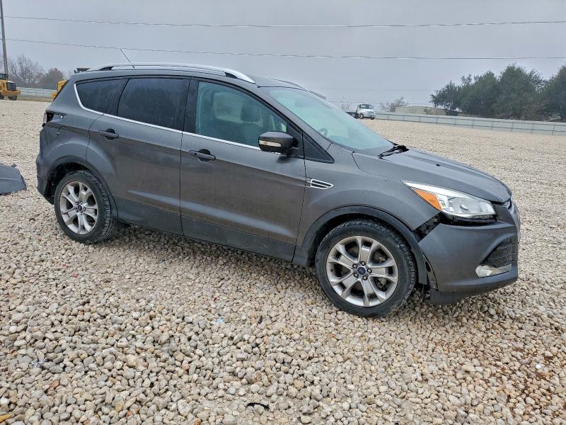Photo 4 from auction – 2016 FORD ESCAPE TIT with VIN 1FMCU0J99GUA28862