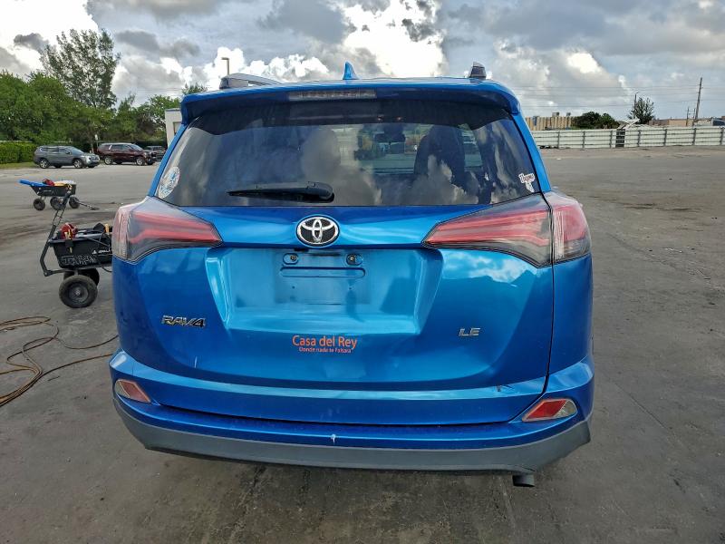 Photo 6 from auction – 2018 TOYOTA RAV4 LE with VIN JTMZFREV2JJ177627