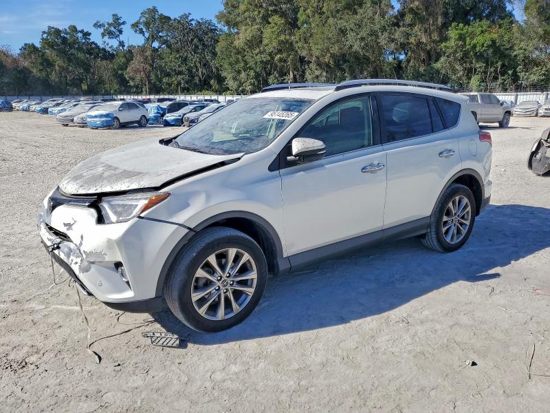 TOYOTA RAV4 LIMIT 2016 with VIN JTMYFREV7GJ066091 - Photo from auction
