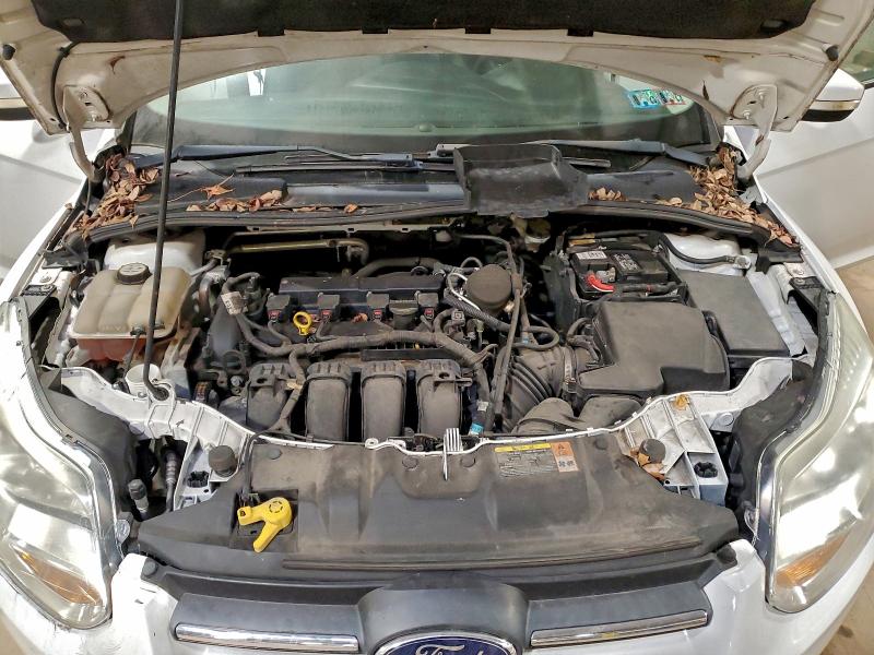 Foto 11 de la subasta – 2013 FORD FOCUS SE con VIN 1FADP3F24DL171285