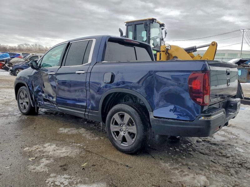Photo 2 from auction – 2020 HONDA RIDGELINE with VIN 5FPYK3F74LB023619