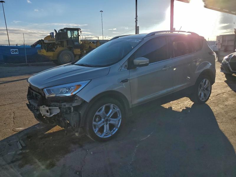 FORD ESCAPE TIT 2017 with VIN 1FMCU0JD7HUE36976 - Photo from auction