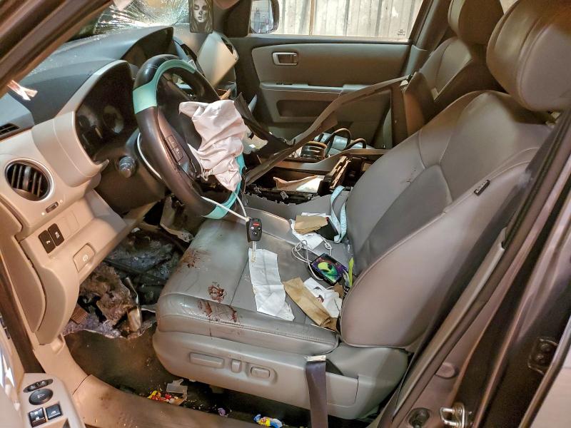 Photo 7 from auction – 2013 HONDA PILOT TOUR with VIN 5FNYF3H95DB019091