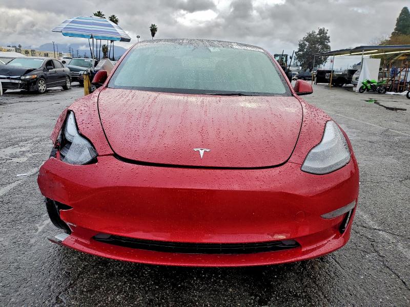 Photo 5 from auction – 2022 TESLA MODEL 3 with VIN 5YJ3E1EA8NF338096