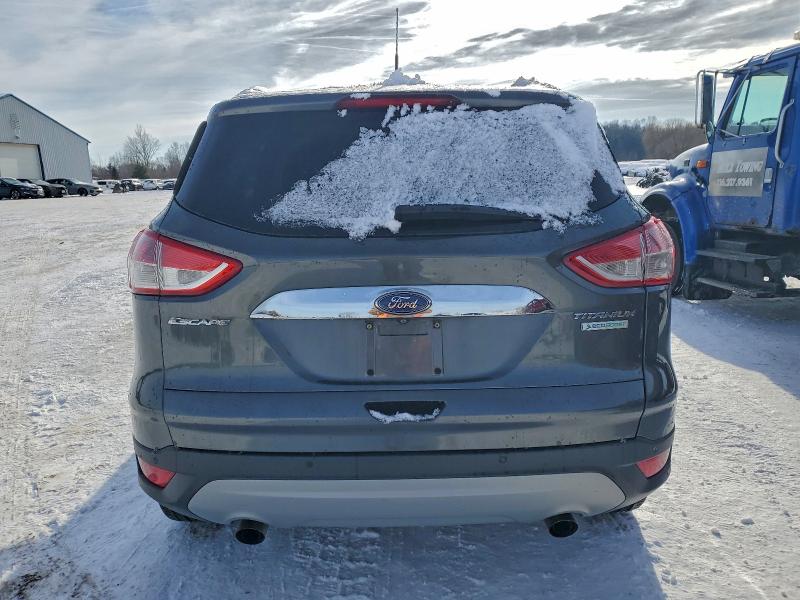 Photo 6 from auction – 2015 FORD ESCAPE TIT with VIN 1FMCU0J96FUA06087