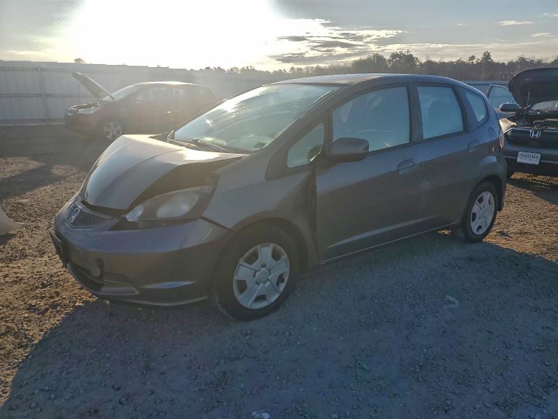 HONDA FIT 2012 with VIN JHMGE8H31CS003977 - Photo from auction
