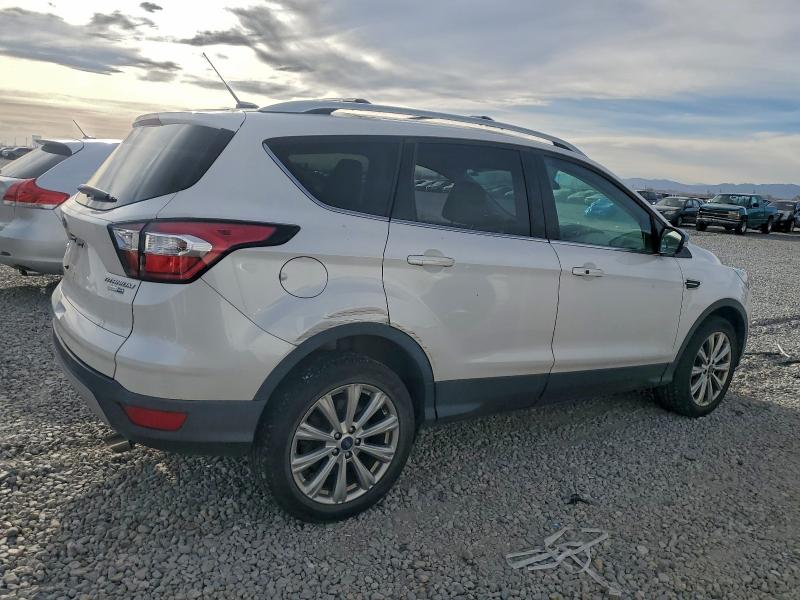 Photo 3 from auction – 2017 FORD ESCAPE TIT with VIN 1FMCU9JD0HUE61741