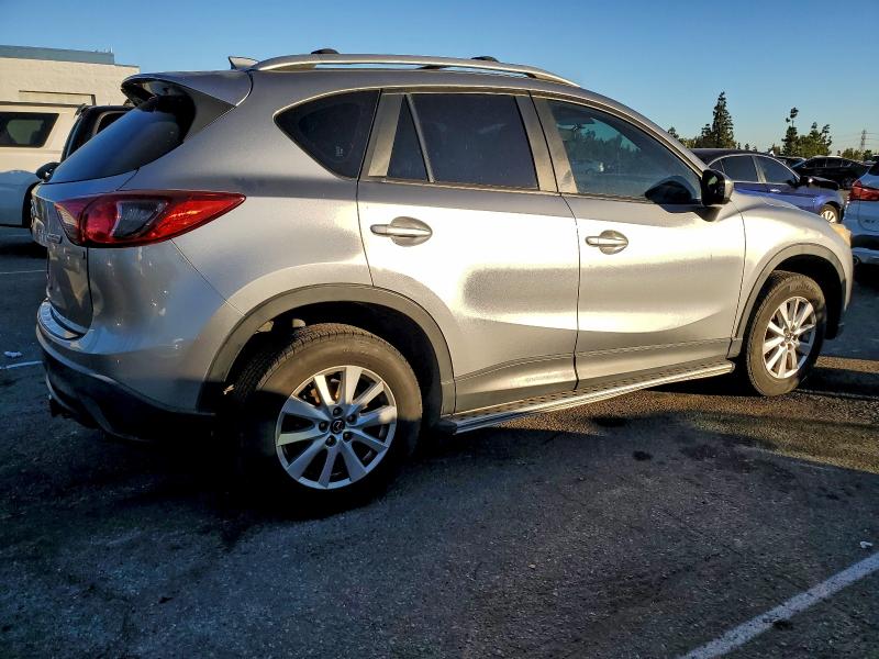 Photo 3 from auction – 2014 MAZDA CX-5 SPORT with VIN JM3KE2BE5E0379221