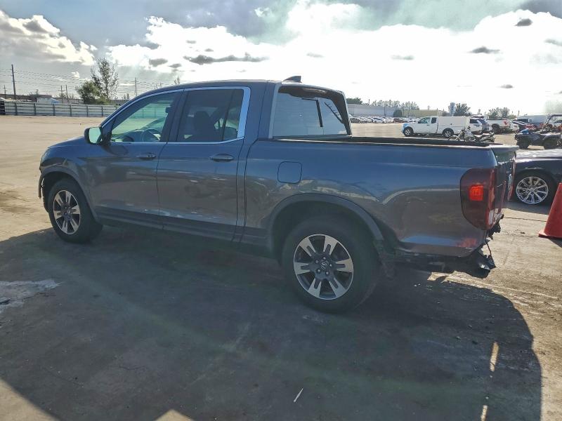 Photo 2 from auction – 2019 HONDA RIDGELINE with VIN 5FPYK2F63KB003121