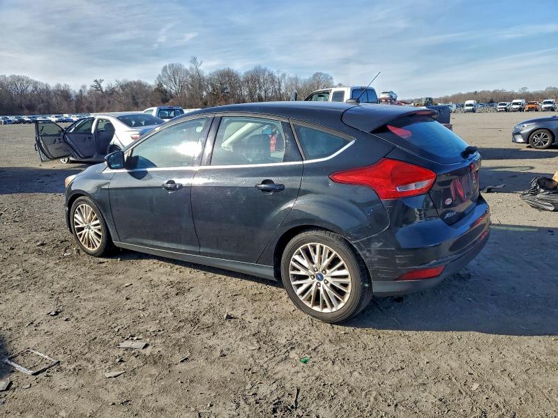 Photo 2 from auction – 2015 FORD FOCUS TITA with VIN 1FADP3N27FL235033