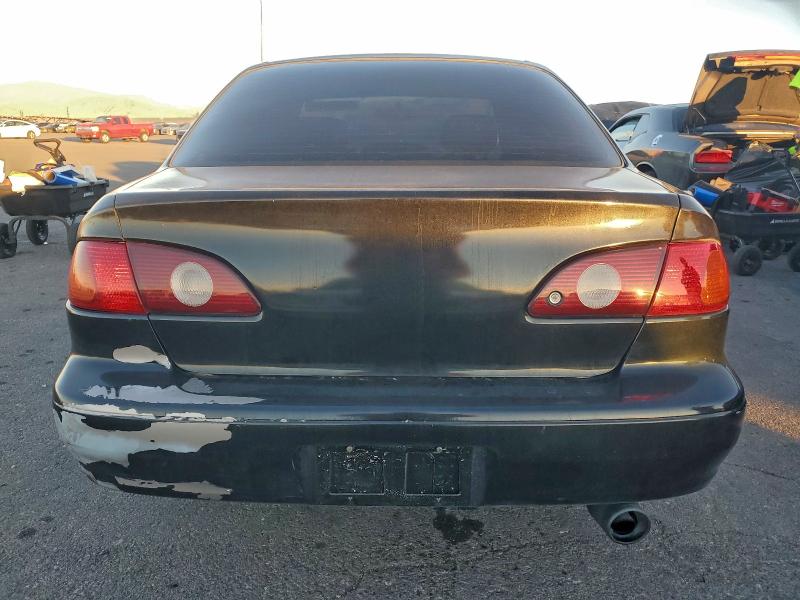Photo 6 from auction – 2002 TOYOTA COROLLA CE with VIN 1NXBR12E62Z627712