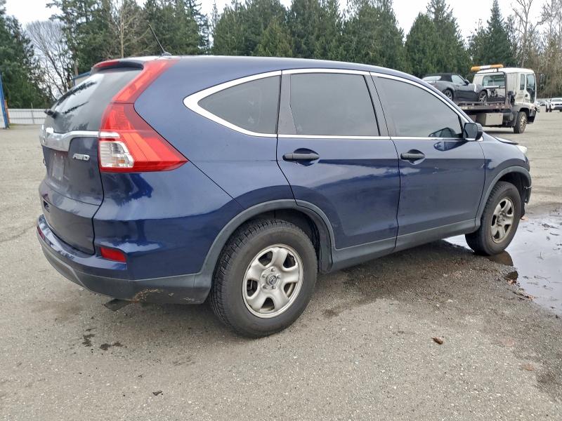 Photo 3 from auction – 2015 HONDA CR-V LX with VIN 5J6RM4H37FL093053
