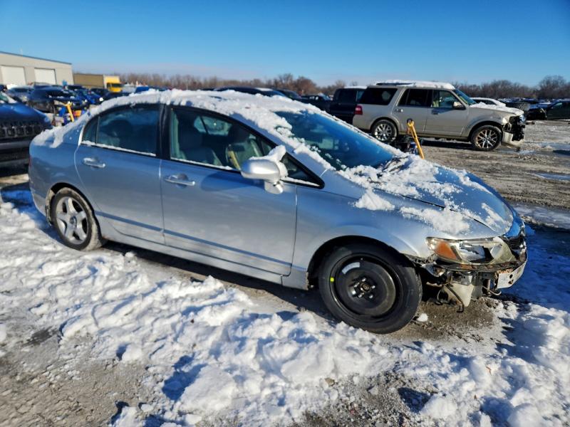 Photo 4 from auction – 2011 HONDA CIVIC EXL with VIN 2HGFA1F93BH522835
